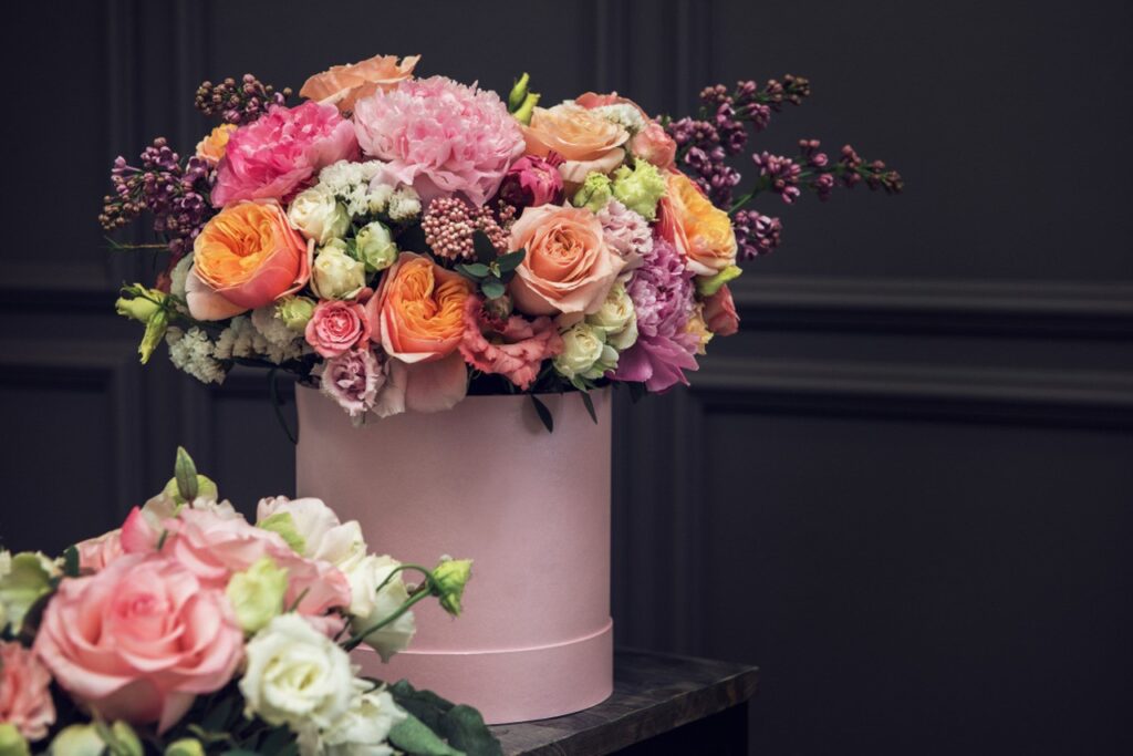 Prepare a Flowerbox: Arrange flowers in a giftbox
